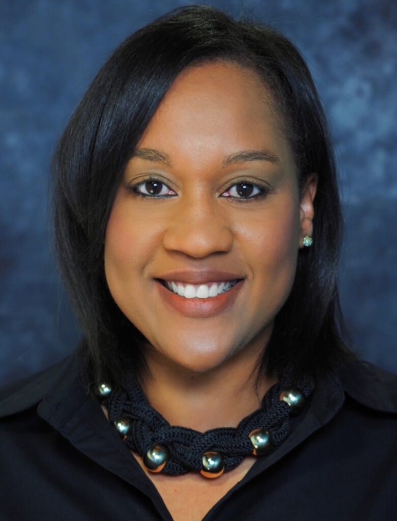 Professional headshot of Angel Walters, Village Co-Leader at the Black Child Development Institute – Greater Los Angeles, wearing a black blouse and beaded necklace.